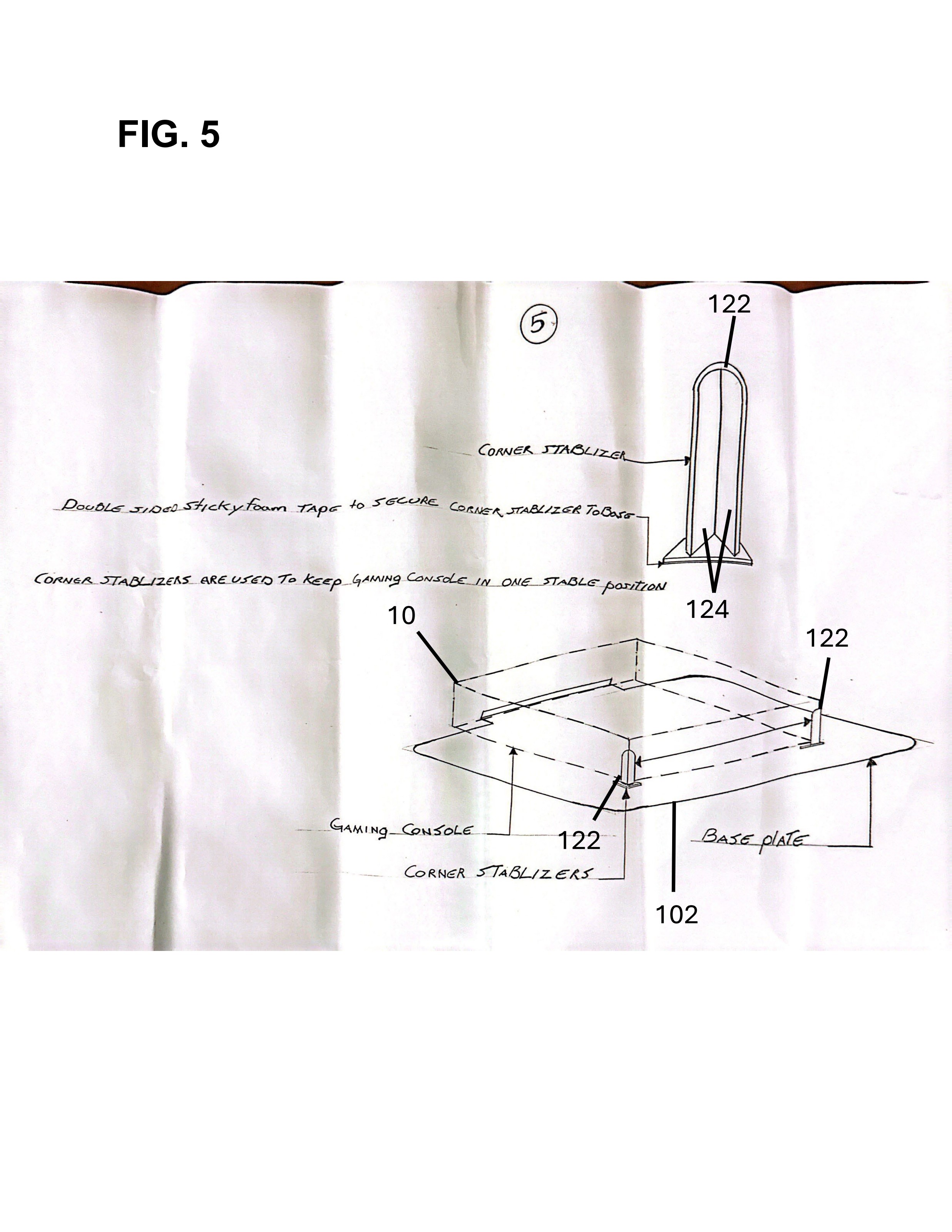 Design drawing showing corner stabilizers positioned around the console on the base plate